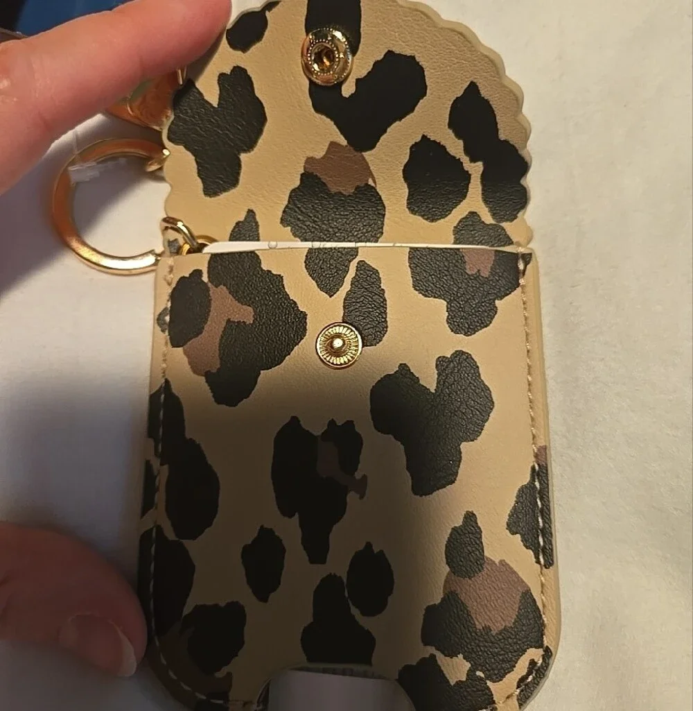 Itzy Ritzy Leopard Print Hand Sanitizer Holster - Beige & Black
